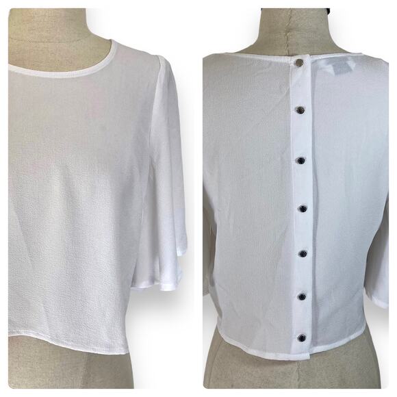 Bebe white button back crop top blouse with fluttery half length flare sleeves - Picture 1 of 7